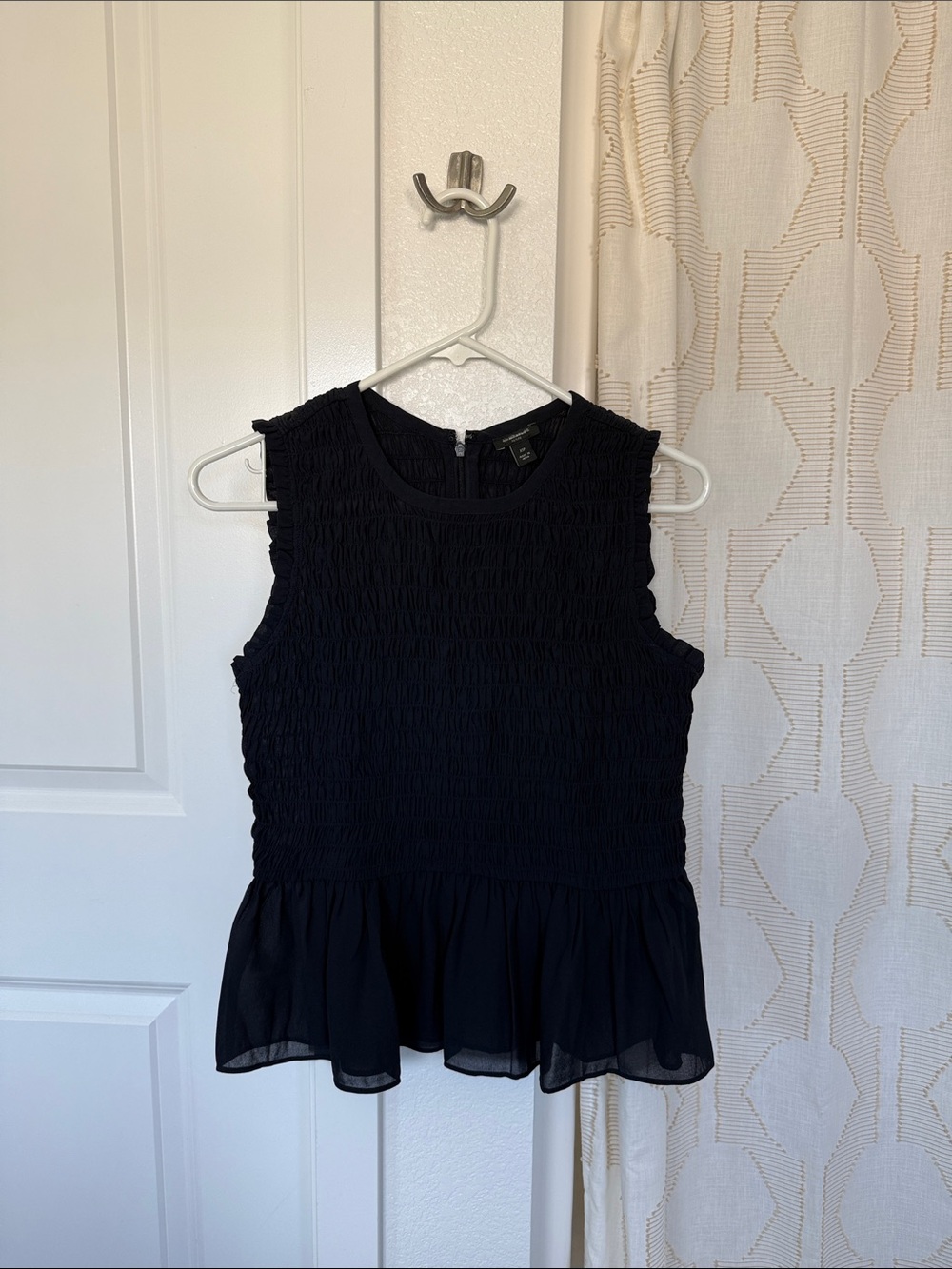 Women’s Navy Blue Sleeveless Smocked Peplum Top
